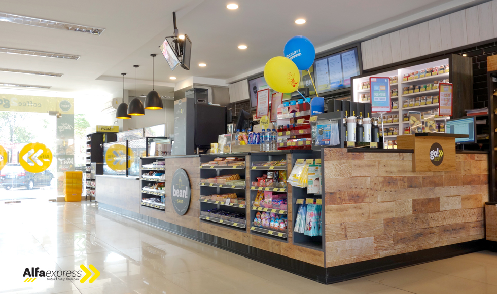 Image showing the FPG c-store fitout featuring the POS counter and integrated confectionary display at Alfaexpress, Rest Area KM102 on the Trans-Java Toll Road, Indonesia.