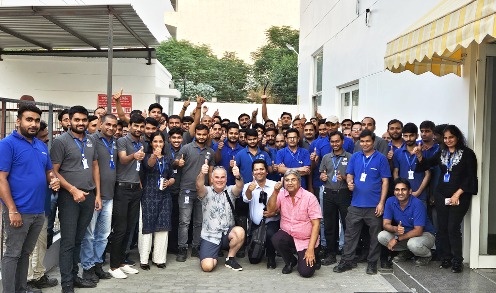 Image showing Robert Darroch CEO FPG and the owners of Antarctica Equipment Gaurav and Vinod Mittal (all kneeling in the centre), together with the Antarctica Equipment team in India. Antarctica Equipment is the FPG Business Partner licensed for the local manufacture and distribution of FPG cabinets across India, Nepal and Bangladesh.