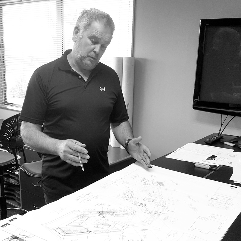 Image showing FPG Founder Robert Darroch sketching a site layout concept freehand.