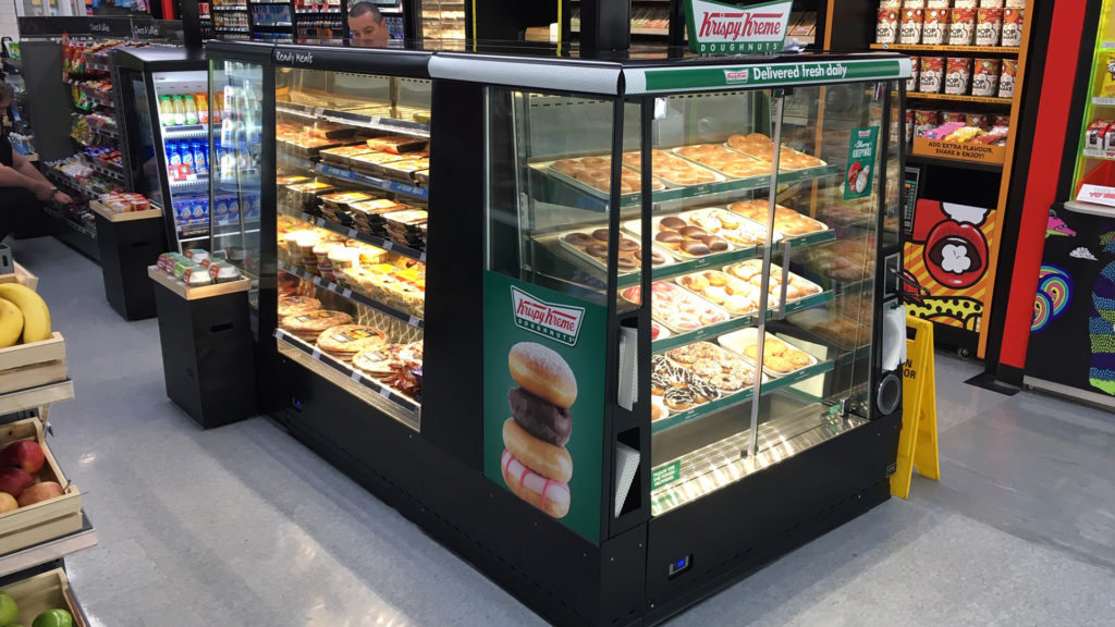Image showing an island of custom FPG Visair Upright refrigerated and controlled ambient cabinets at 7-Eleven Melbourne, Australia.