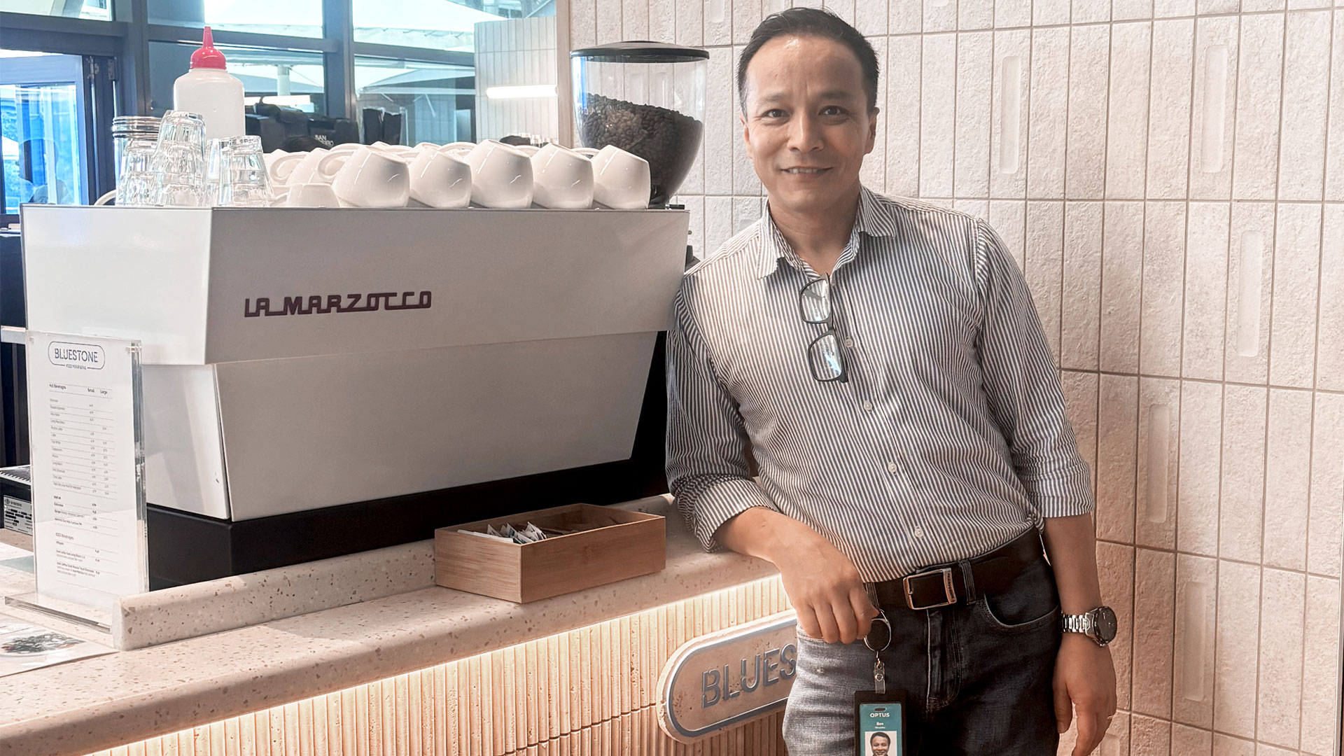 Image showing Ben Shrestha owner Bluestone Café in Sydney in front of new counter.