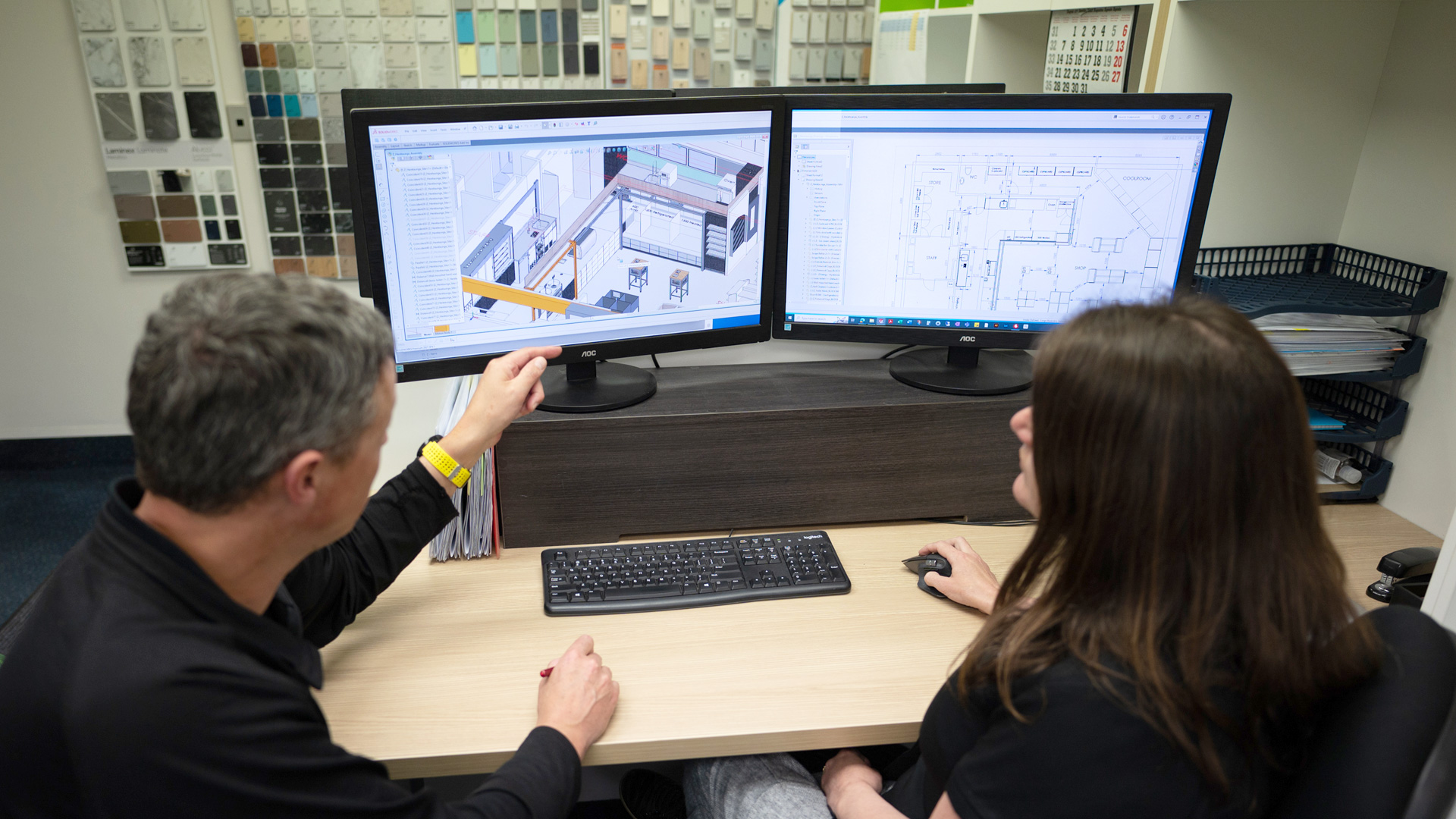 Image showing FPG Concept Design and Joinery Production Engineering team reviewing 3D plans and elevations.