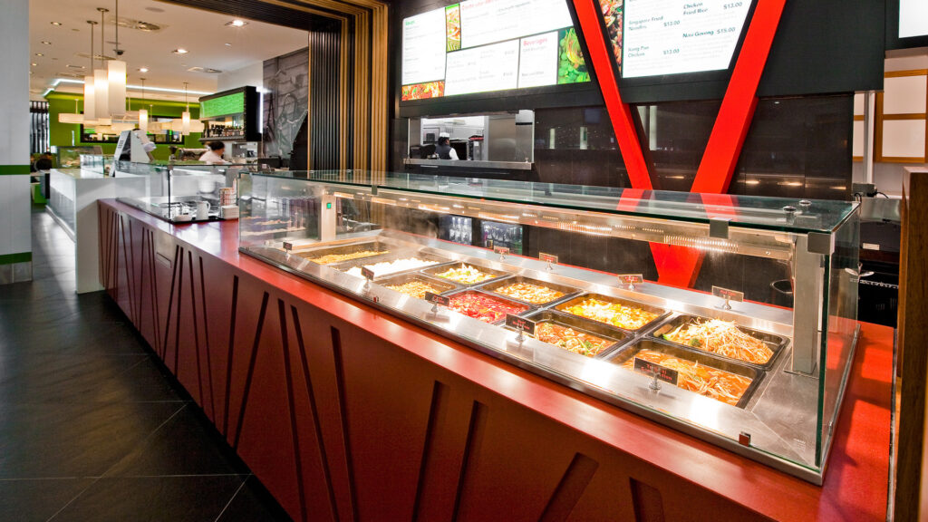 Image showing FPG Inline GN Heated buffet solution with serve over glass gantry at Christchurch Airport, New Zealand.