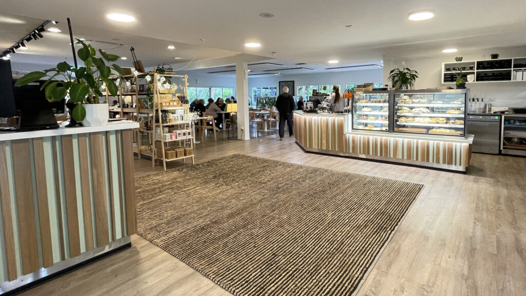 Image showing No. 5 Café & Larder, Hastings, New Zealand. Custom fitout including underlit counter joinery and Inline 4000 refrigerated food display cabinets.
