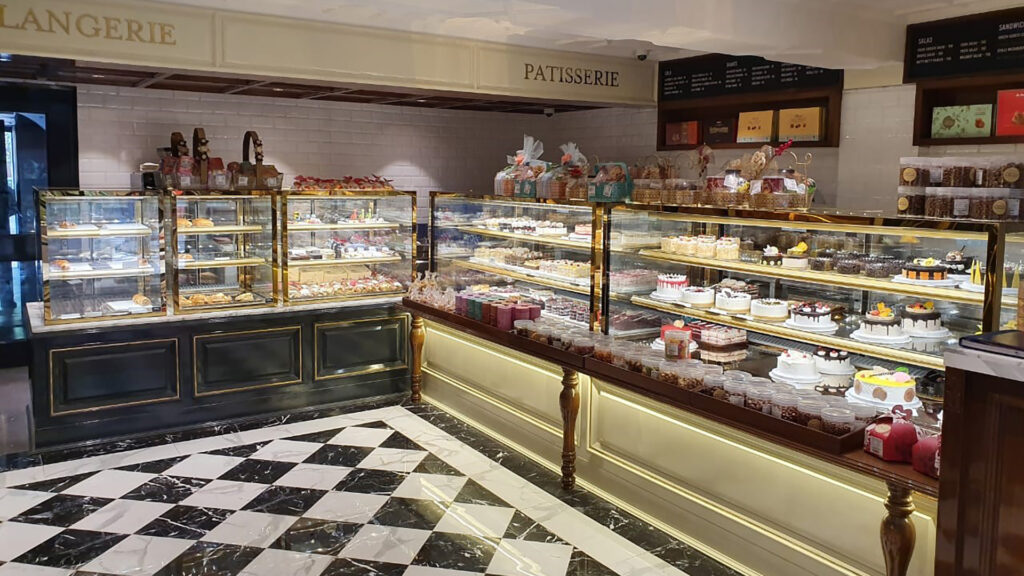 Image showing a customised FPG Inline 3000 refrigerated food display cabinets at a bakery in India. Manufactured locally by FPG licensed business partner, Antarctica Equipment.