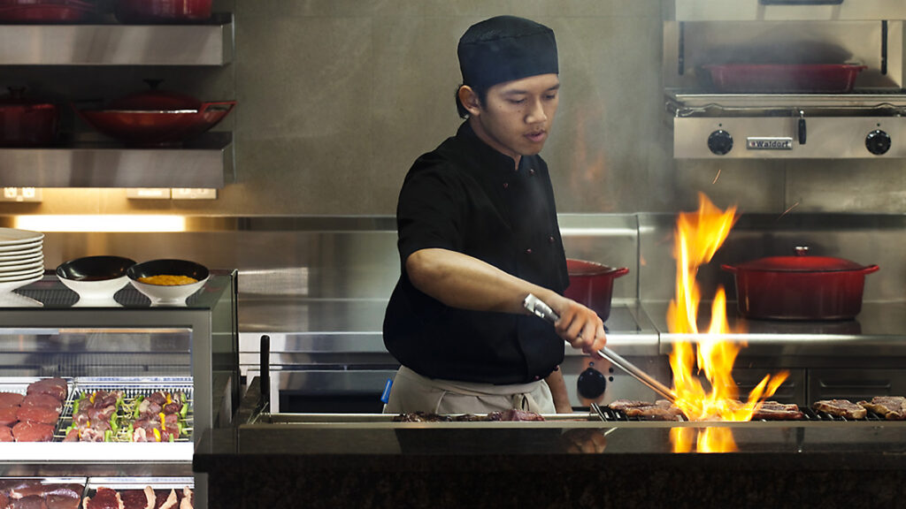 Eight Restaurant, Langham Hotel, Auckland, New Zealand. FPG Custom Fitout including grill station for meat. Delivered in partnership with Wildfire Commercial Kitchens & Bars.