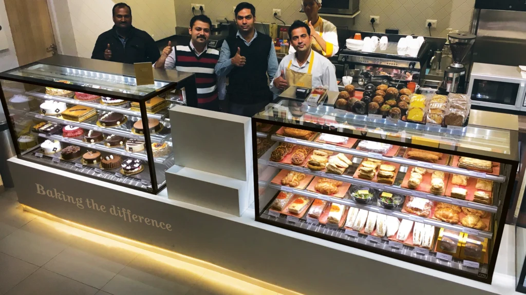 Image showing FPG Inline 3000 Refrigerated Display Cabinets fully stocked at High Street Bakery, India.