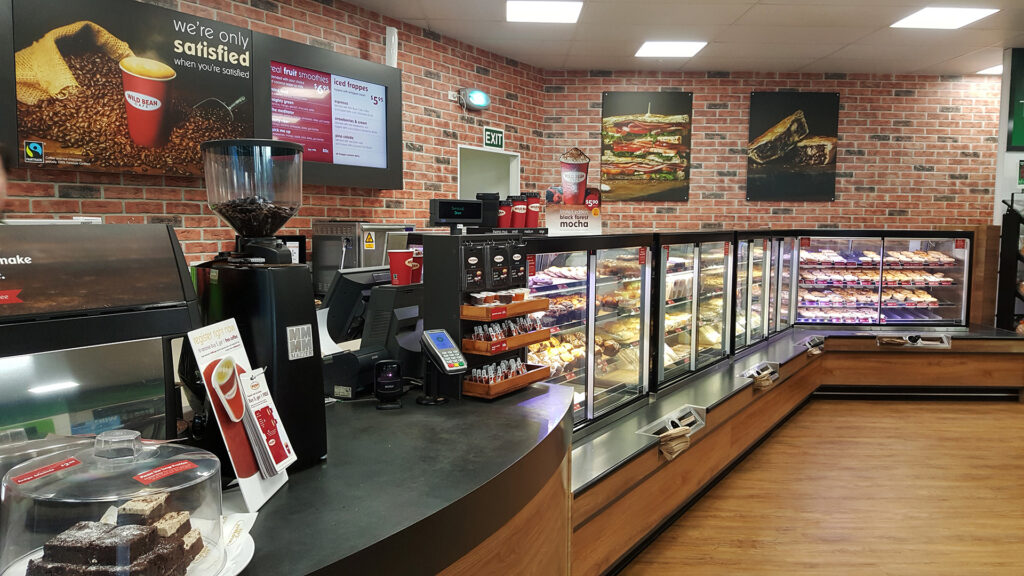 A lineup of FPG Inline 5000 food display cabinets at BP Wild Bean Cafe, Bayview, New Zealand.