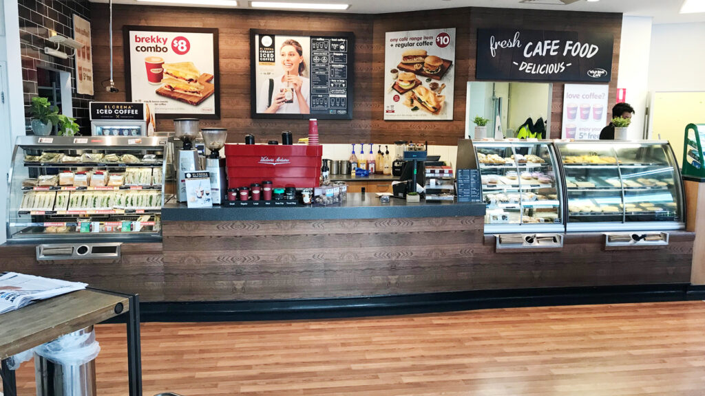 Image showing stocked FPG Inline Curved refrigerated and heated food display cabinets at BP Bayside, New Zealand.