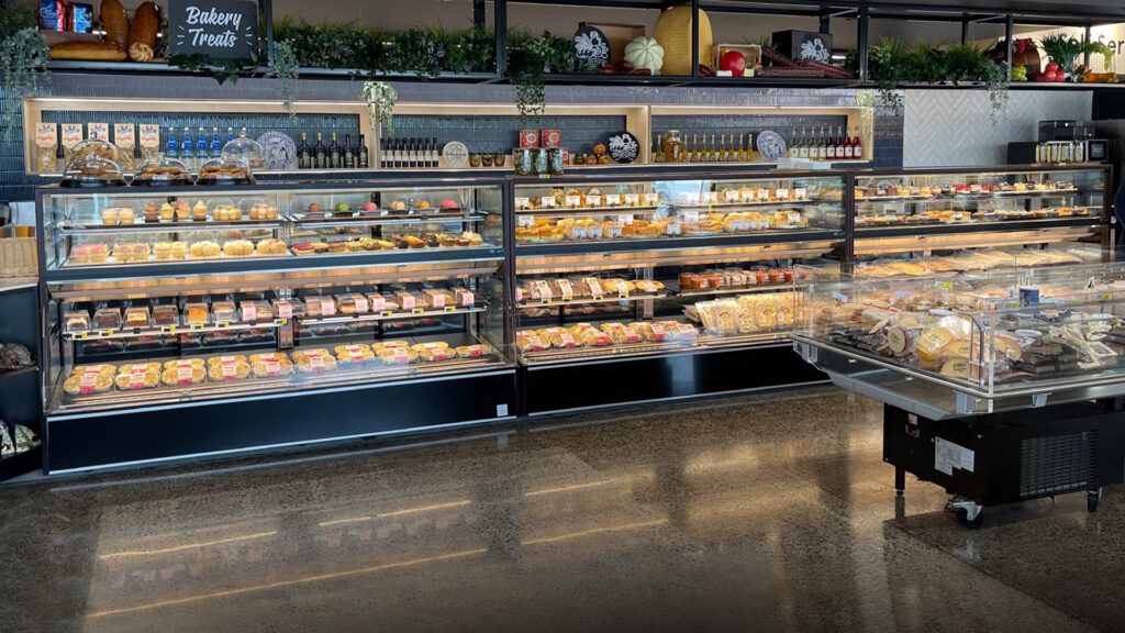 Image showing an impressive line-up of FPG Isoform Grab&Go 2400 refrigerated cabinets at IGA Caulfield, Australia