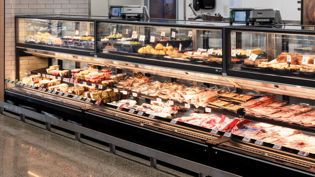 Image showing multiplexed FPG Isoform Grab&Go 2400 refrigerated cabinets used for the deli display at New World supermarket, Hobsonville, New Zealand.