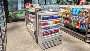 FPG Custom Cabinet: Impulse Slim 13H 09W Refrigerated Image showing FPG Impulse Slim 13H 09W Refrigerated cabinet stocked with icy cold drinks at the 7 Eleven demo store, Australia.